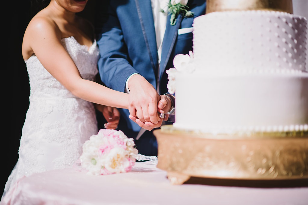 53 Bride and Groom Cutting Cake