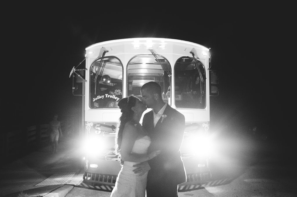 Bride and Groom in front of Jolley Trolley