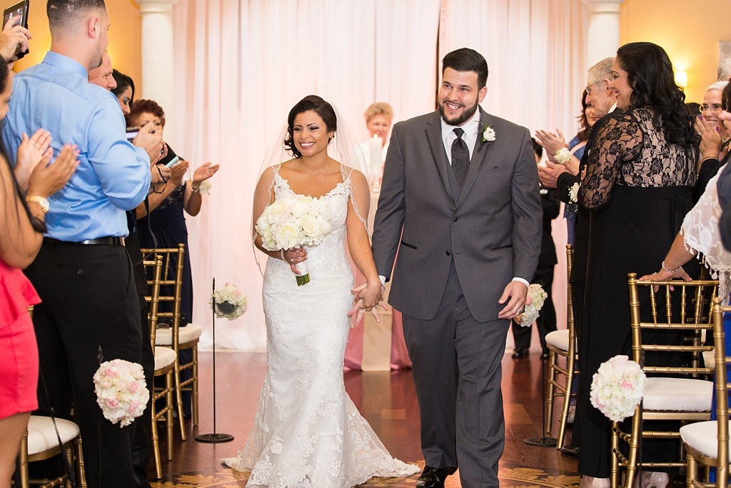 Tampa Bride and Groom Walk Down the Aisle