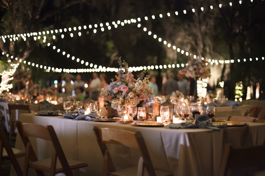 Rustic, Sarasota Wedding Reception at Oaks at Windsong Wedding Venue with Lantern Lights at Night