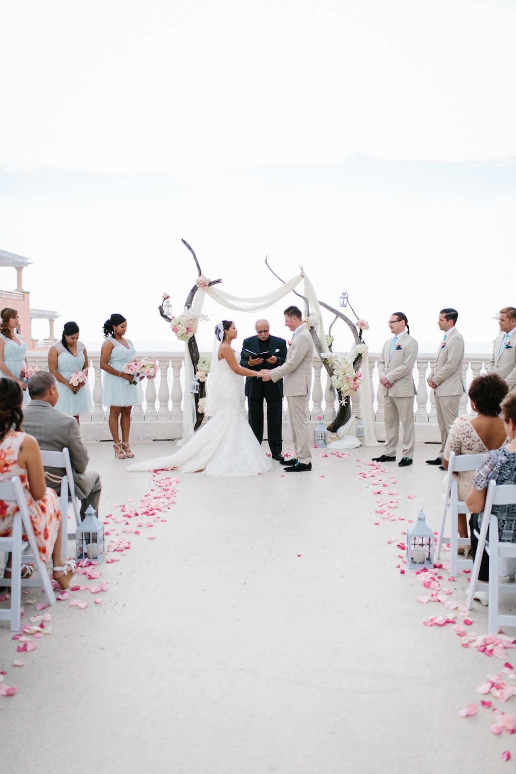 Destination Wedding in Clearwater Beach, FL Pink Flowers and Wood Arch Wedding Ceremony Decor