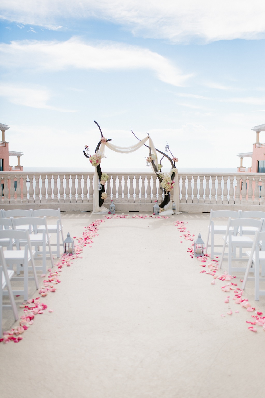 Destination Wedding in Clearwater Beach, FL Pink Flowers and Wood Arch Wedding Ceremony Decor