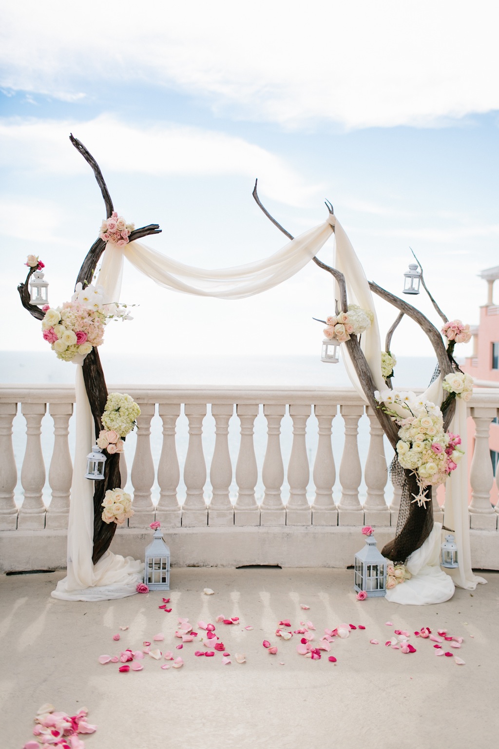 Destination Wedding in Clearwater Beach, FL Pink Flowers and Wood Arch Wedding Ceremony Decor