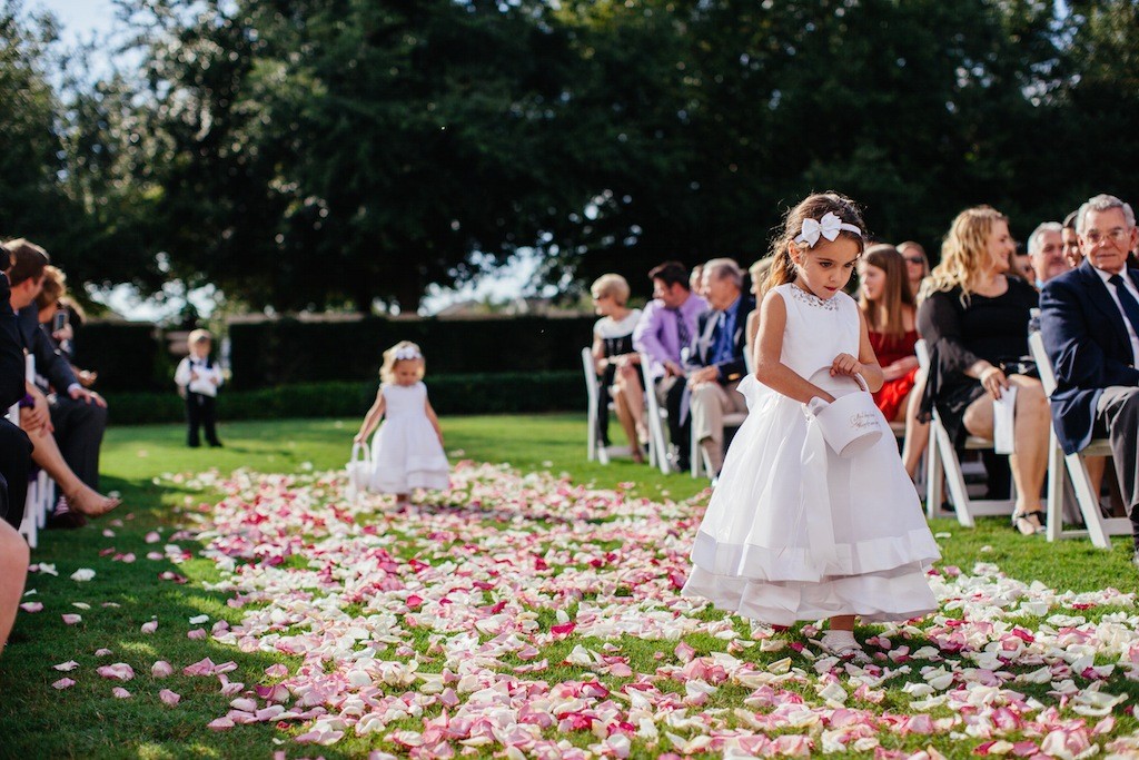 Flower Girls Walking Down Rose Petal Wedding Aisle