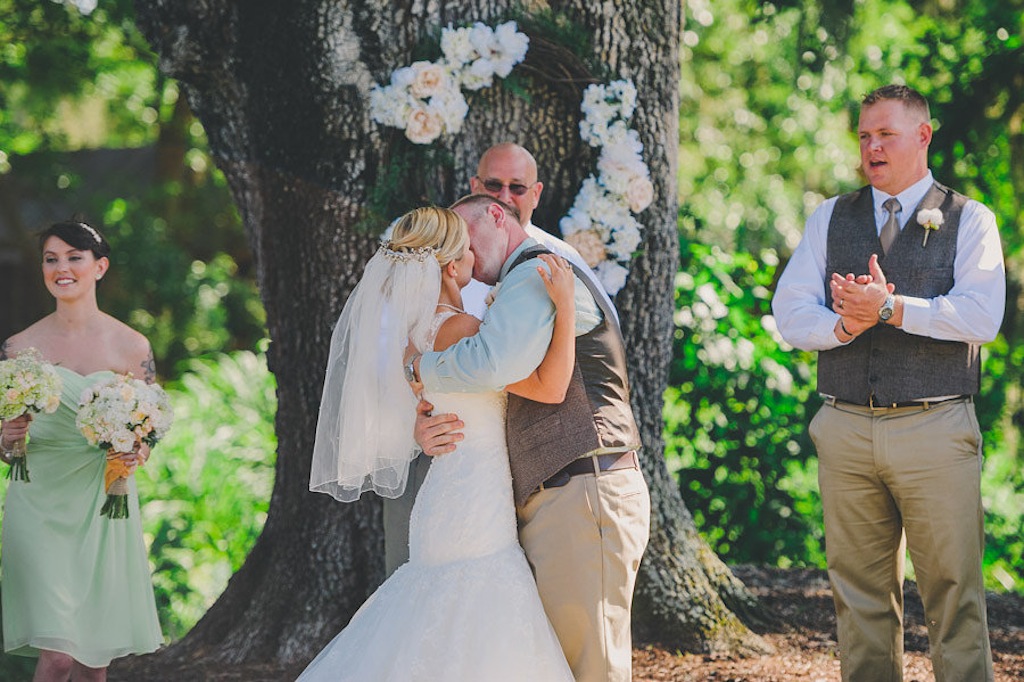 Bride and Groom Kissing at Wedding Ceremony