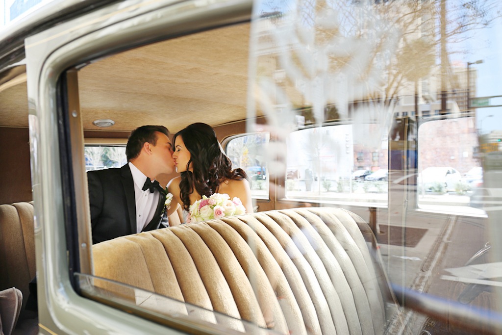 Bride and Groom in Vintage Car