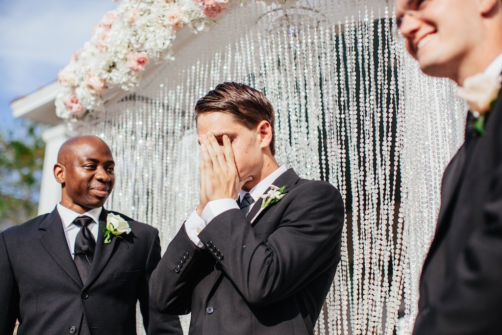 Emotional Groom Seeing Bride Walk Down the Aisle on Wedding Day