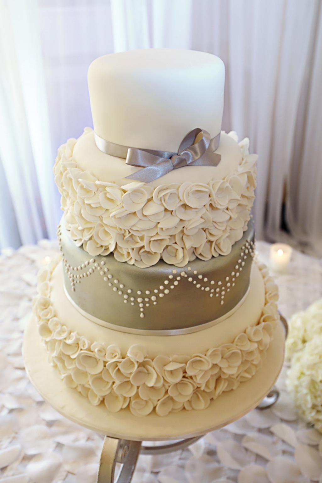 Round 4-Tiered White Ruffled Wedding Cake