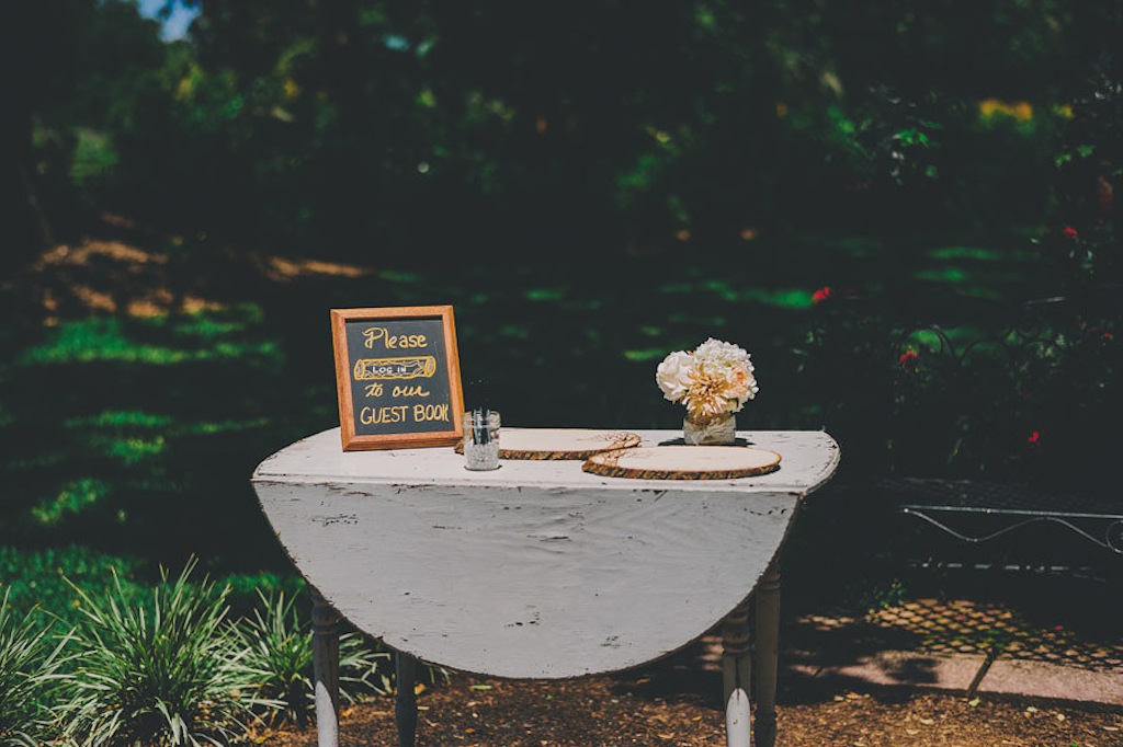 Rustic Guestbook Table with Chalkboard Sign