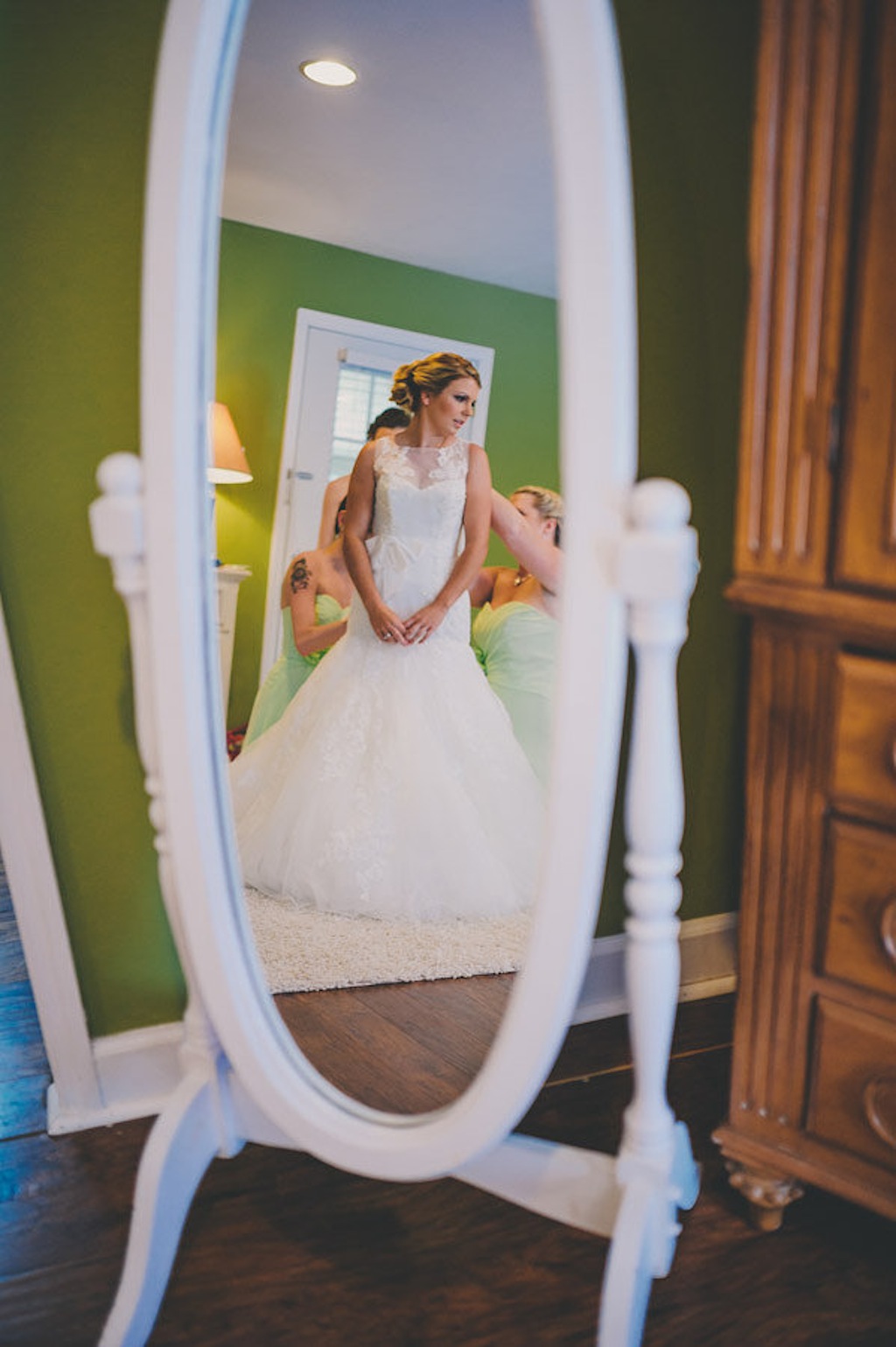 Bride Getting Dressed on Wedding Day