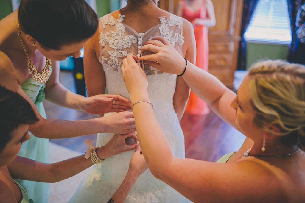 Lace Back Wedding Dress with Buttons - Bride Getting Dressed on Wedding Day