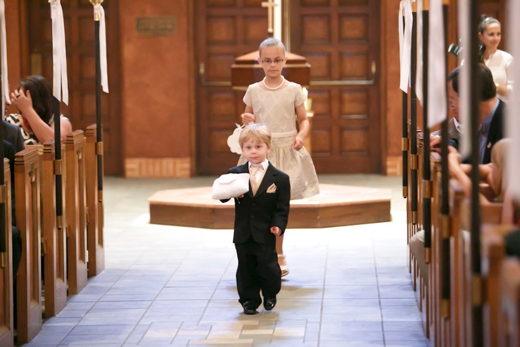 Ring Bearer Walking Down the Church Wedding Aisle