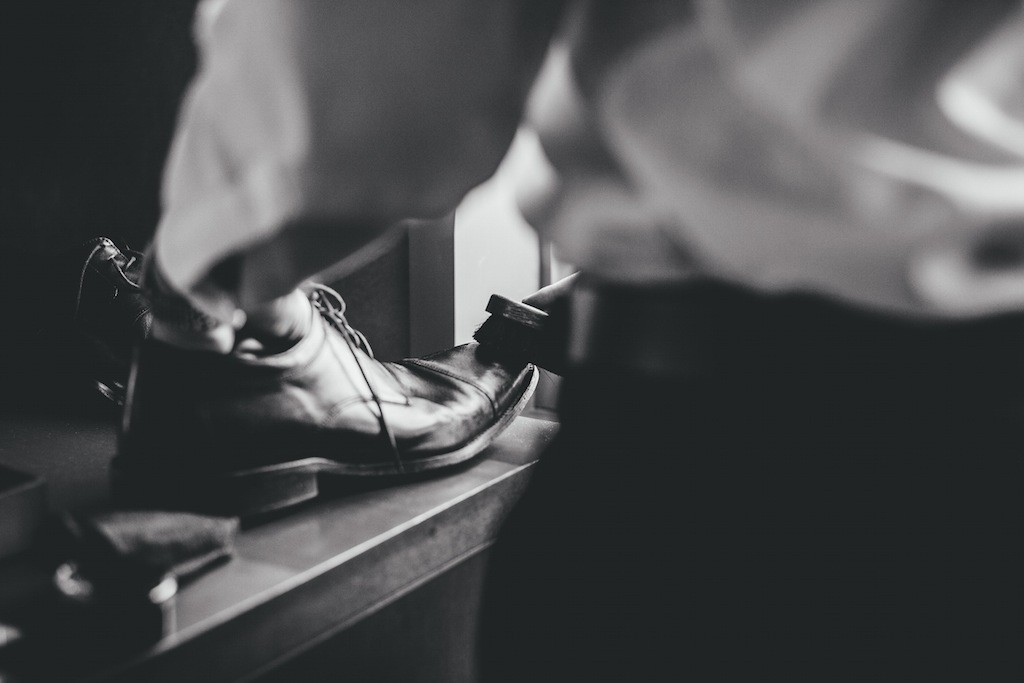 Groom Getting Ready Shining Shoes