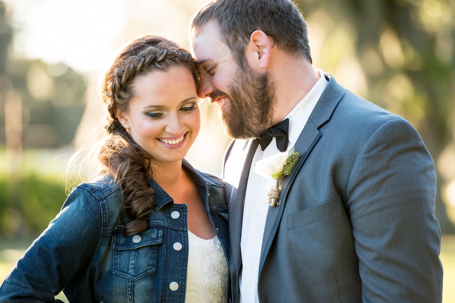 Rustic, Country Bride Wearing Jean Jacket with Braided Hair | Jeff Mason Photography