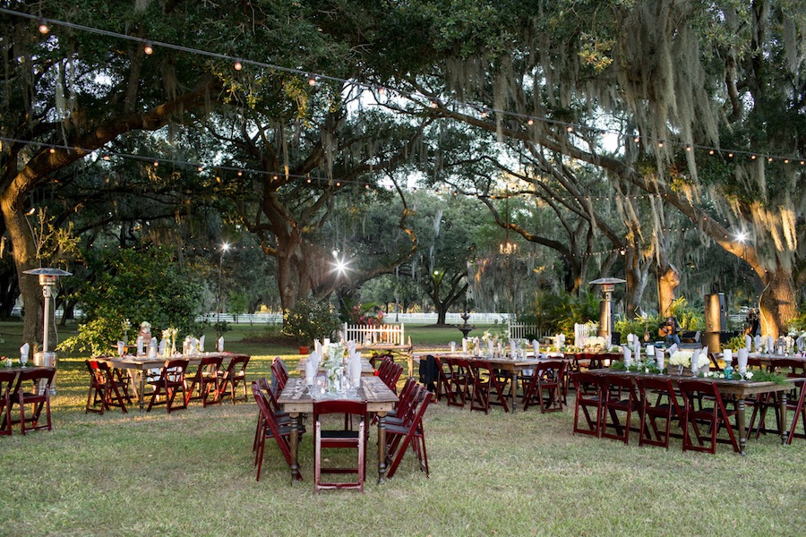 Outdoor Rustic Wedding Reception with Farm Tables | Lakeland Wedding Venue Rocking H Ranch