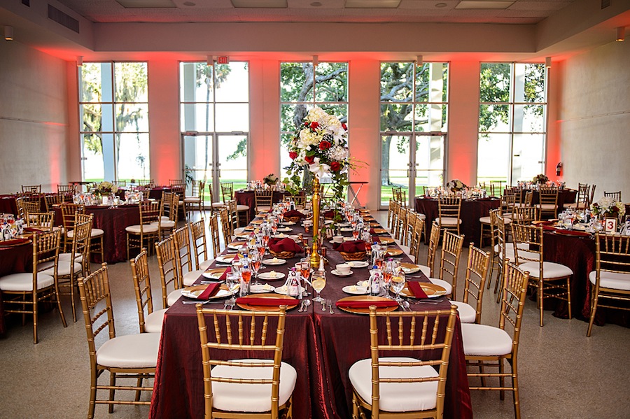 Red and Burgundy Wedding Ceremony Decor with Gold Chiavari Chairs