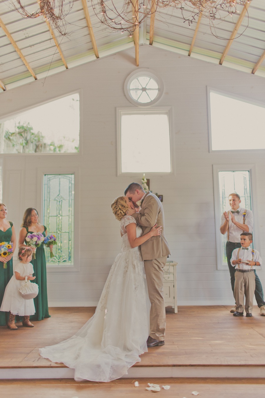 Rustic, Cross Creek Ranch Chapel Wedding Ceremony | Bride and Groom First Kiss