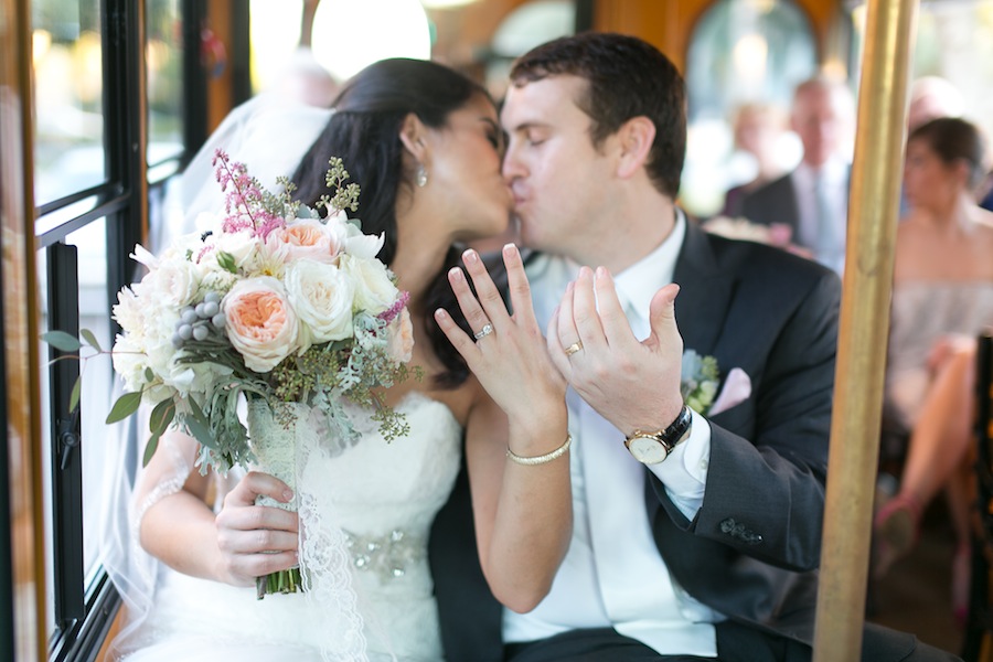 22 Downtown St. Pete Bride and Groom on Jolley Trolley | Wedding Portrait by Roohi Photography