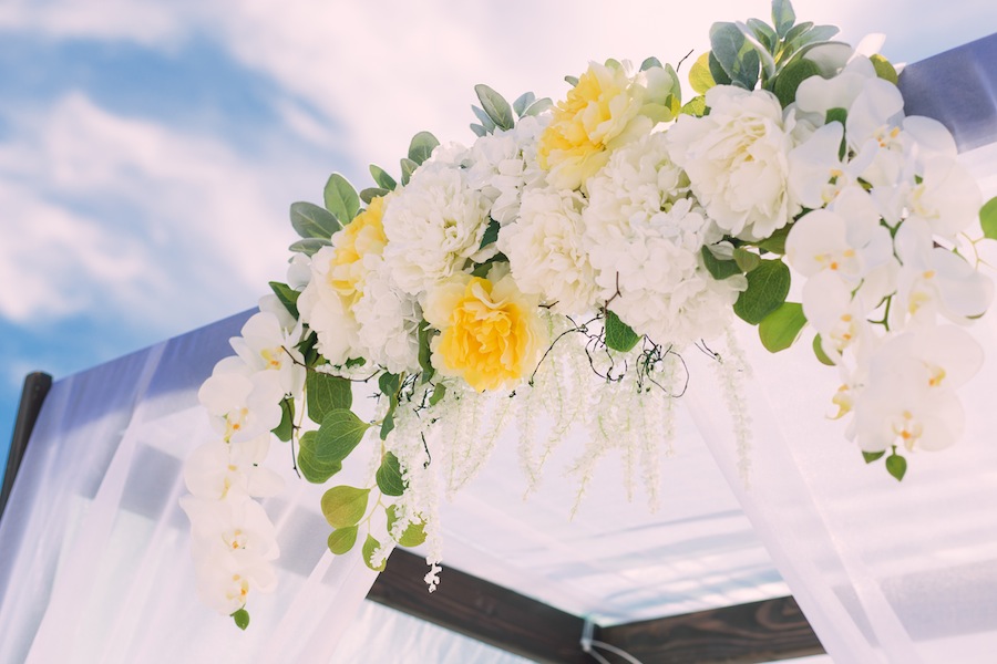 Beach Wedding Ceremony Decor | Wooden Alter with Yellow and White Flowers