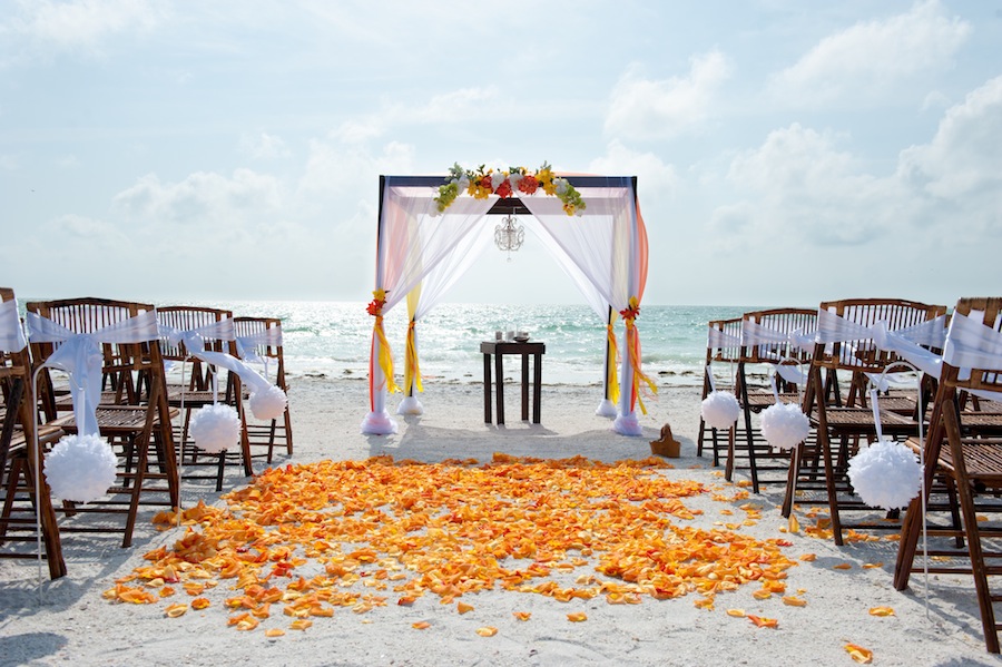 Orange and Red Beach Wedding Ceremony with Wooden Alter and Chandelier | Tide the Knot Beach Weddings
