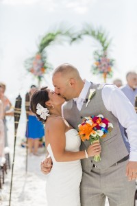 Siesta Key Beach Bride and Groom Kiss on Wedding Day | L. Martin Photography