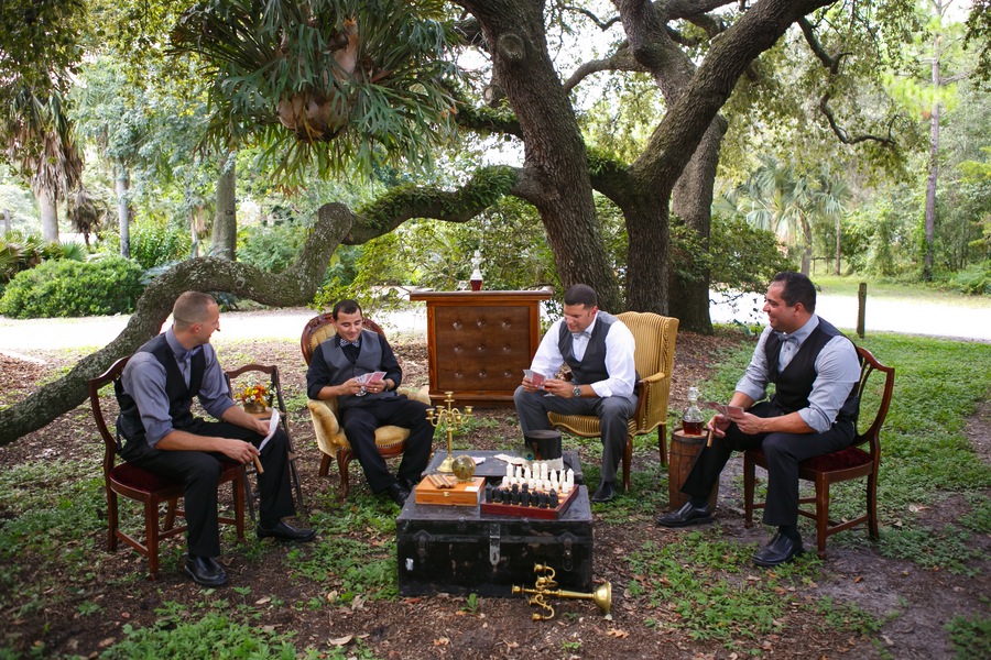 Groomsmen Playing Chess Vintage Wedding Decor | Tampa Wedding Venue USF Botanical Gardens | Tufted Vintage Rentals