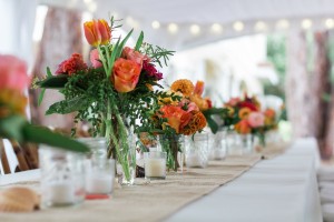 Orange and Pink Wedding Centerpieces | Long Feasting Tables with Burlap Runner