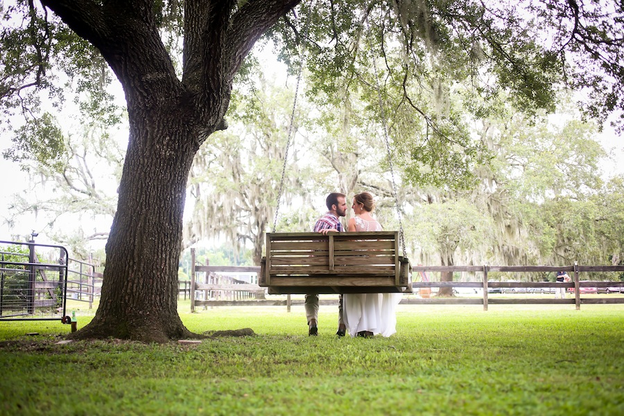 Rustic, Bride and Groom on Swing on Wedding Day | St. Pete Wedding Planner Blue Skies Events