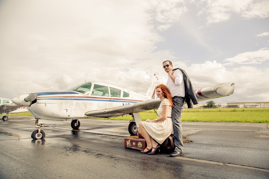 Plane with Vintage Suitcases | Plant City Vintage Airport Engagement Shoot