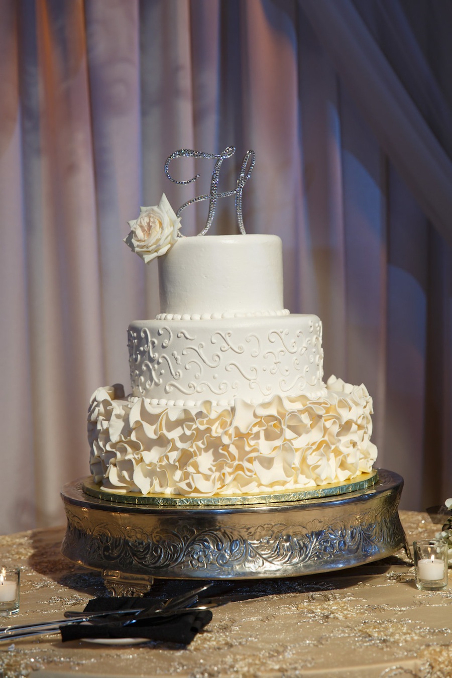Round White Wedding Cake with Ruffled Layer
