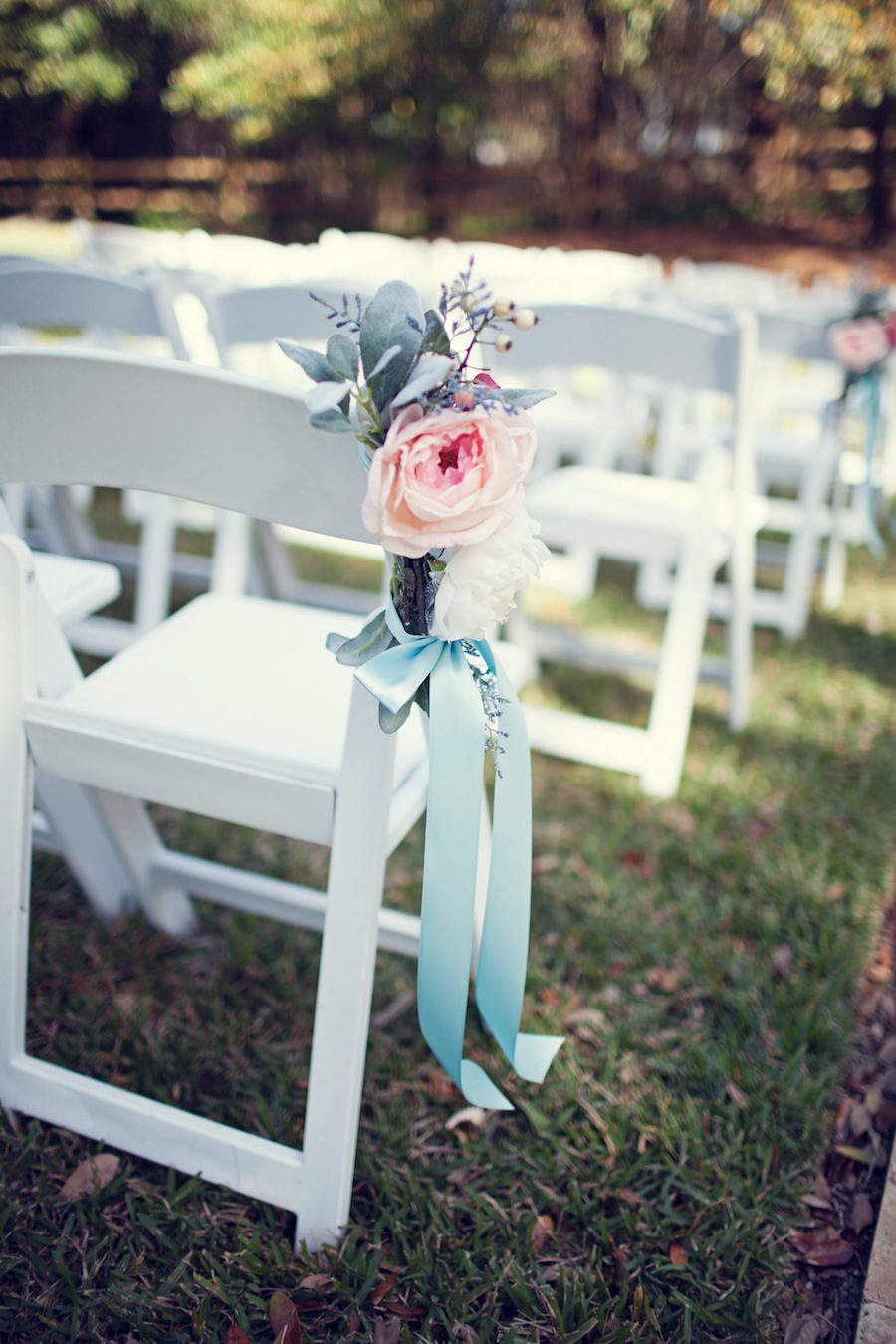Pastel, Light Pink, Blush Wedding Ceremony Flowers and Decor | Folding White Chairs with Flowers