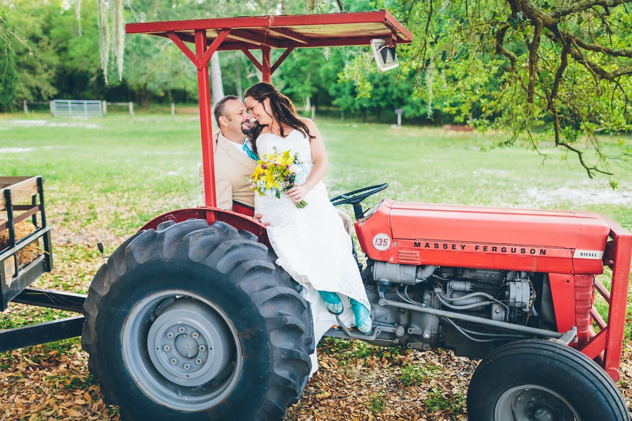 Bride and Groom Wedding Portrait on Tractor | Tampa Wedding Photographer Darin Crofton Photography