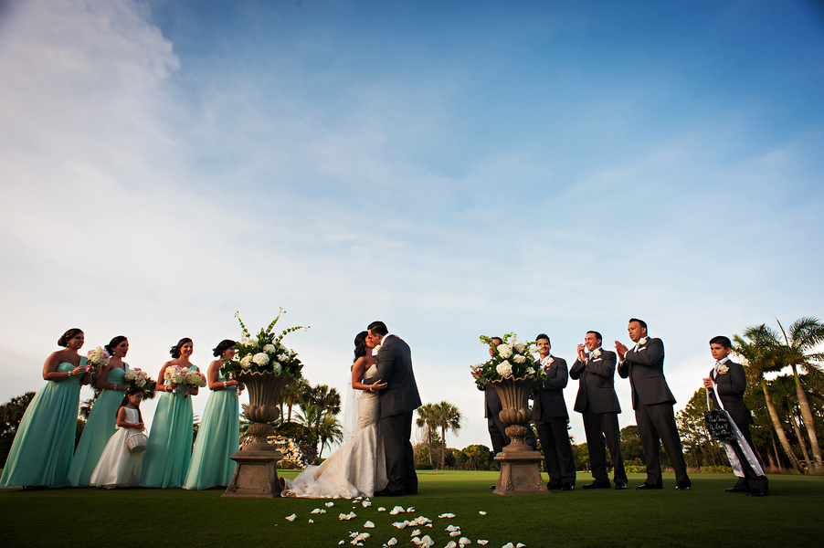 Bride and Groom First Kiss at Outdoor Golf Course Wedding Ceremony | Clearwater Wedding Venue Countryside Country Club