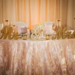 Tampa Bay Wedding Linen Rental Company Custom Linens | Sheer Embroidered Champagne Tablecloth Overlay for Wedding Sweetheart Table