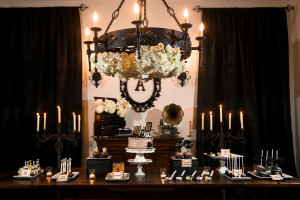 Dark, Halloween Inspired Cake and Dessert Table With Candelabras and White Flowers | Tampa Wedding Photographer Marc Edwards Photographs