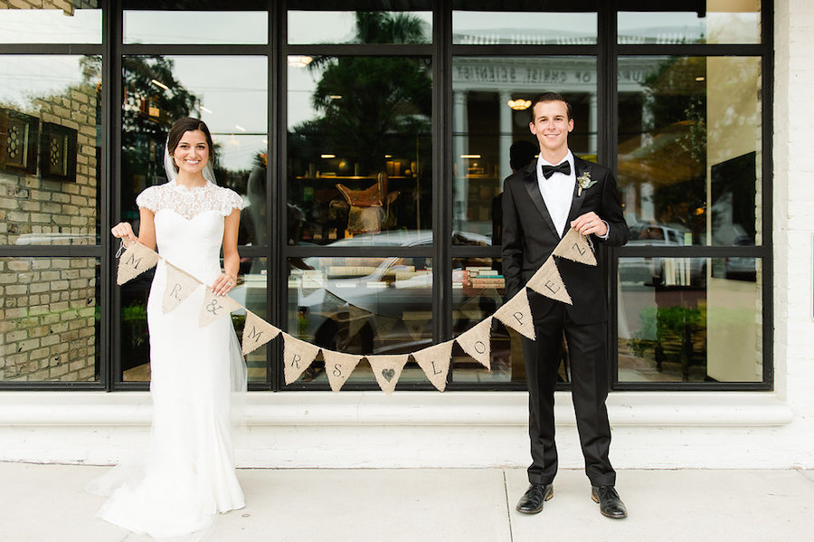 Mr. and Mrs. Bride and Groom Holding Burlap String Banner Wedding Portrait | Tampa Wedding Photographer Ailyn LaTorre Photography