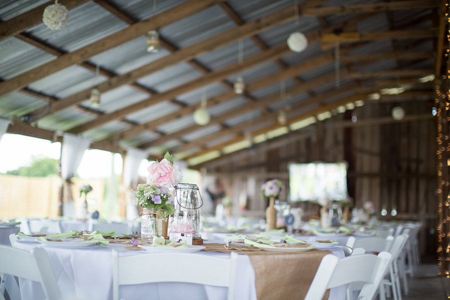 Rustic Wedding Reception Centerpieces with Pink Flowers Mason Jars and Burlap Runners | Plant City Wedding Venue Wishing Well Barn