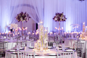 Lavish Purple Indian Wedding Reception with Tall Centerpieces and Chiavari Chairs | Ritz Carlton Sarasota Beach Club on Lido Key