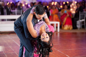 Purple and Pink Sari Indian Bride and Groom Wedding First Dance | Ritz Carlton Sarasota Beach Club on Lido Key