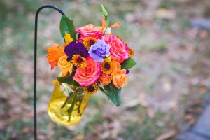 Pink, Orange and Purple Wedding Ceremony Flowers on Shepards Hook