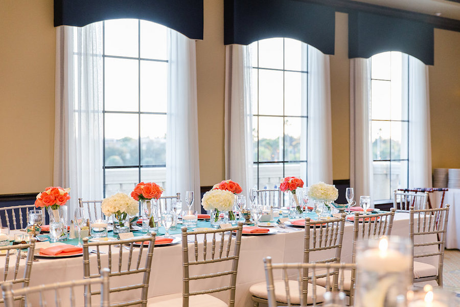 Teal and Coral Hydragena and Rose Wedding Centerpieces with Long Feasting Tables | Wedding Reception at The Club at Treasure Island