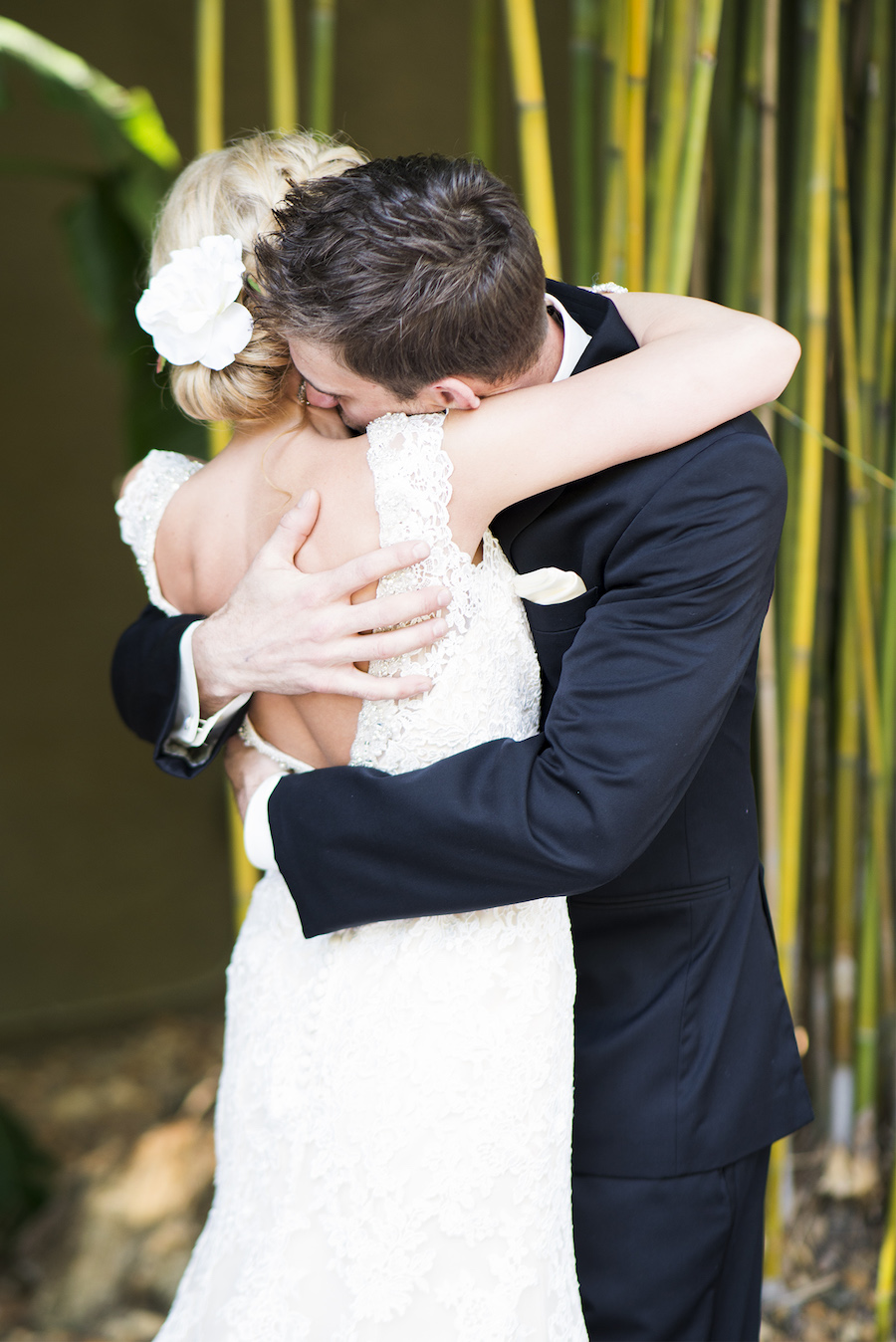 Bride and Groom Hugging after First Look on Wedding Day
