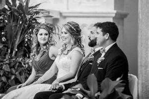 Bride and Groom at Wedding Ceremony Holding Hands | Tampa Ceremony Venue Sacred Heart Catholic Church | Tampa Wedding Photographer Rad Red Creative
