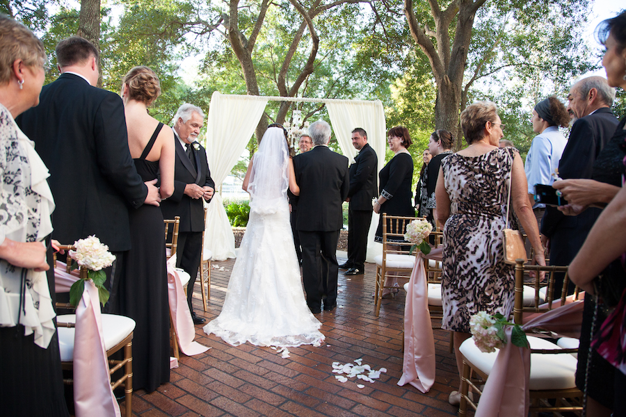 Outdoor Wedding Ceremony Decor with Alter Draping and White and Pink Flowers | Downtown Tampa Wedding Venue The Straz Center