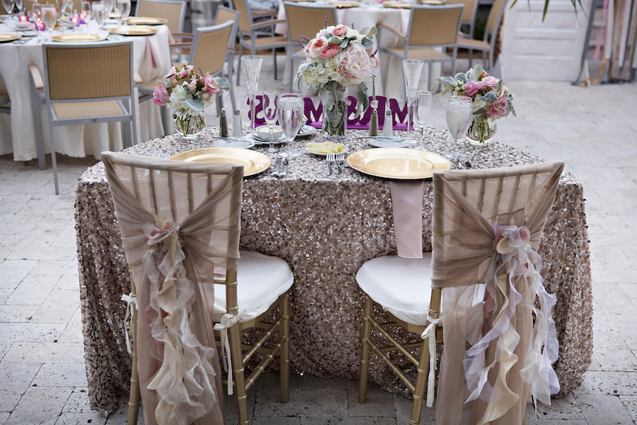 Romantic Wedding Reception Sweetheart Table with Gold Sequin Linen and Pink, Sheer Chiavari Chair Wraps