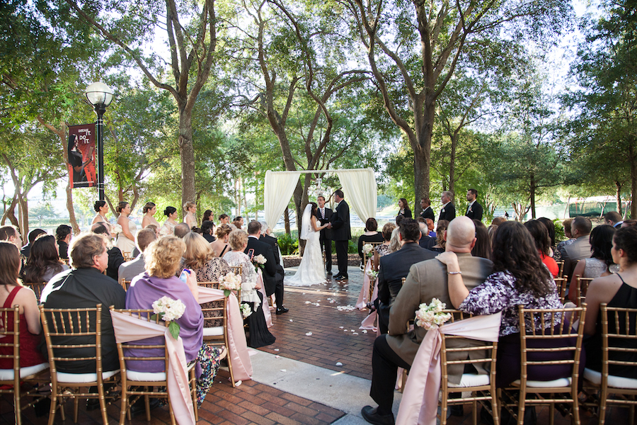 Outdoor Wedding Ceremony Decor with Alter Draping and White and Pink Flowers | Downtown Tampa Wedding Venue The Straz Center