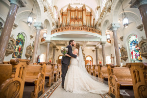 Bride and Groom Kissing Portriat at Tampa Wedding Ceremony Venue Sacred Heart Church |Tampa Wedding Photographer Rad Red Creative
