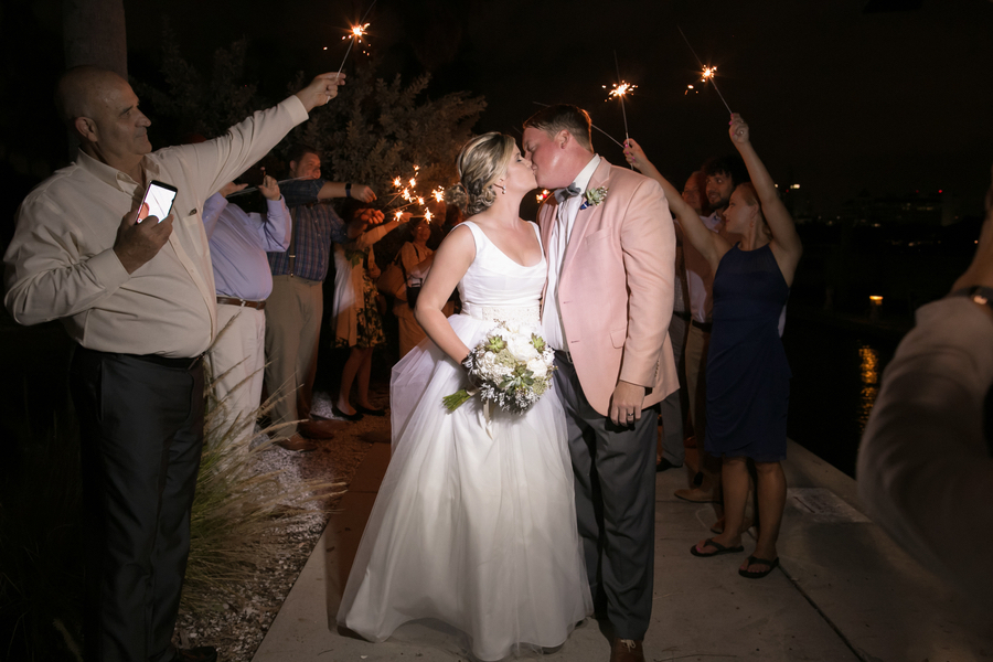 Tampa Reception, Outdoor Sparkler Exit with Bride and Groom Kissing Florida Bride and Groom Wedding Portrait with Dog | Outdoor, Waterfront Florida Bride and Groom First Look | Tampa Wedding Photographer Carrie Wildes Photography