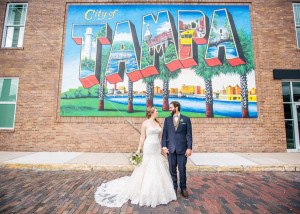 Bride and Groom Wedding Portrait in Front of Tampa Graffiti Sign Downtown | Tampa Wedding Photographer Rad Red Creative