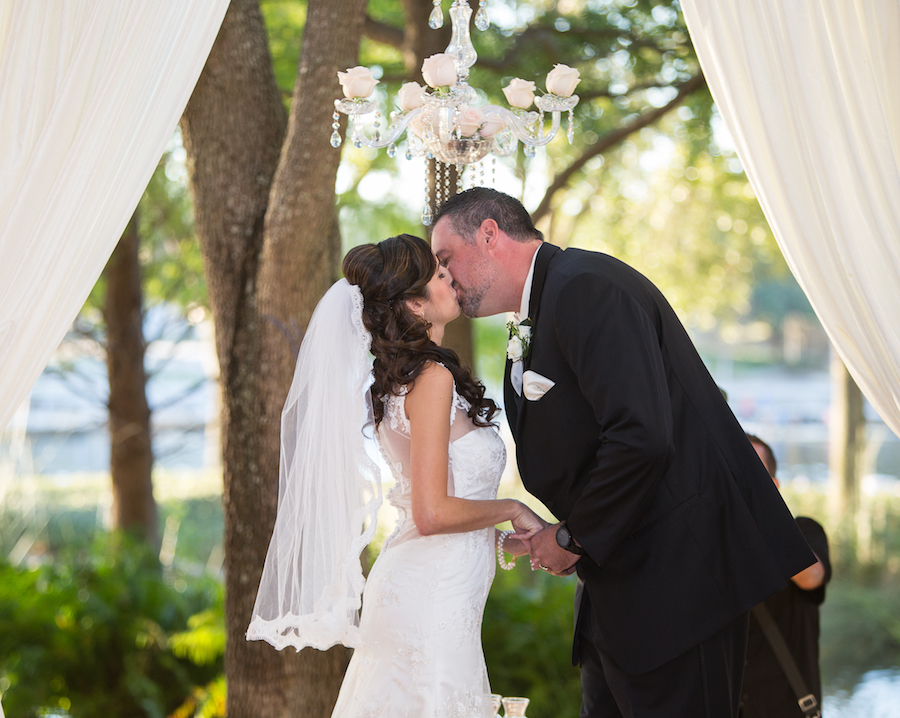Bride and Groom First Kiss | Outdoor Wedding Ceremony at Downtown Tampa Wedding Venue The Straz Center